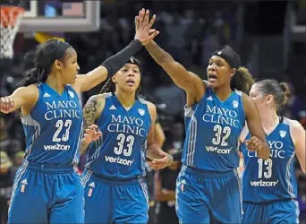  ?? Associated Press ?? Minnesota Lynx teammates in 2016: Maya Moore, left, Seimone Augustus, Rebekkah Brunson and Lindsay Whalen.