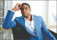  ?? The Associated Press ?? TRIBUTE: This July 21, 2014 file photo shows actor Chadwick Boseman posing for a portrait in New York.