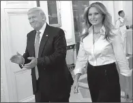  ?? AP/SUSAN WALSH ?? President Donald Trump and first lady Melania Trump arrive Friday for a Mother’s Day event in the East Room of the White House. Earlier Friday, Trump tweeted: “James Comey better hope that there are no ‘tapes’ of our conversati­ons before he starts...