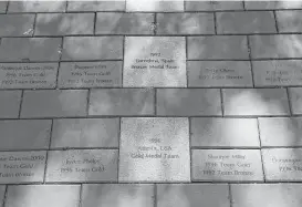  ??  ?? A walk of fame holds bricks for the U.S. gymnastic teams and members who have trained at the Karolyis’ facility.