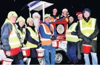  ??  ?? Church and Oswaldtwis­tle Rotary Santa Sleigh helpers