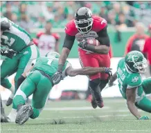  ?? MICHAEL BELL ?? Stampeders running back Jerome Messam was back to his old self on Sunday, running through Saskatchew­an defences.