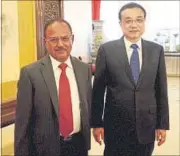  ?? PTI ?? National security adviser Ajit Doval with Chinese premier Li Keqiang after the 19th round of boundary talks in Beijing on Thursday.