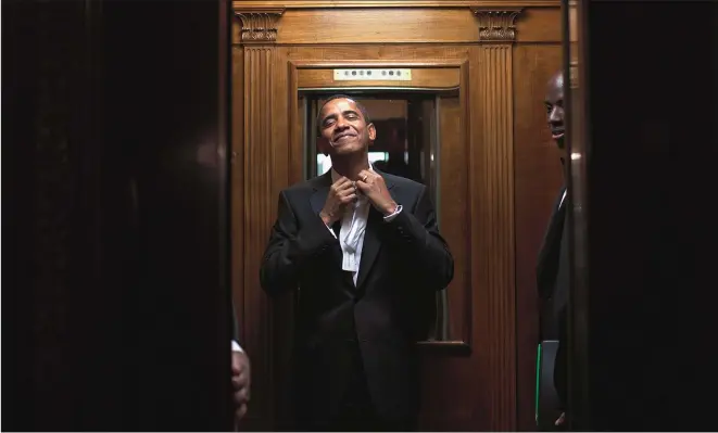  ??  ?? This picture captures one of the good days. The President in the elevator to his private residence after his inaugural party at the White House