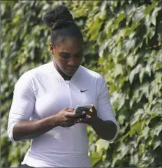  ?? Matthew Lewis/Getty Images ?? Serena Williams arrives for practice Sunday in advance of her fourth-round match against Evgeniya Rodina at Wimbledon.