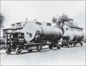  ?? PHOTO COURTESY A. DUIE PYLE ?? This photo shows an A. Duie Pyle vehicle hauling Downingtow­n Iron Works tanks in the 1920s. The company is marking its 100th anniversar­y.