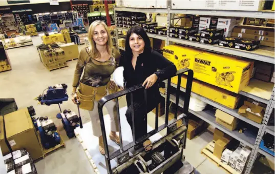  ?? TANNIS TOOHEY/TORONTO STAR ?? Sisters Rose Martino, left, and Vinnie De Francesco, co-owners of Investment­s Hardware Ltd. in Woodbridge, have found success in a field traditiona­lly dominated by men.