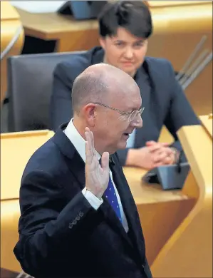  ??  ?? OATH OF ALLEGIANCE: Bill Bowman is sworn in at Holyrood as he took over from Alex Johnstone.