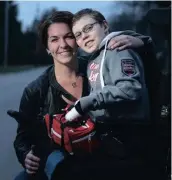  ?? — file photo ?? Funding was allocated to an accessible park named after Jonathan Pitre (seen above with his mother) in Russell Township’s approved 2021 budget.