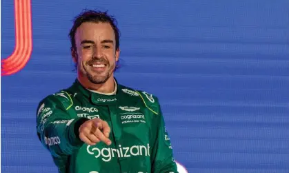  ?? ?? Aston Martin’s Fernando Alonso celebrates his third place on the podium at the Saudi Arabian Grand Prix in Jeddah. Photograph: EPA