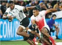  ??  ?? Flier: Fiji’s Sevuloni Mocenacagi scores against Japan