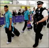  ?? AP photo ?? Members of the Brazilian men’s soccer team arrive on Tuesday at Heathrow Airport in London, ahead of the start of Olympics.