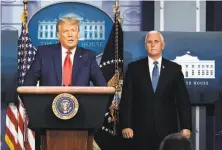  ?? Kevin Dietsch / TNS 2020 ?? Vice President Mike Pence ( right) has given no indication he is willing to invoke the 25th Amendment to remove Trump.
