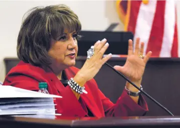  ??  ?? Santa Fe Public Schools Superinten­dent Veronica García testifies Monday on the opening day of what is planned to be a nine-week-long trial over whether New Mexico is giving enough money on a per-pupil basis to public education. García said it is...