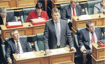  ?? Photo: CHRIS SKELTON/FAIRFAX NZ ?? Nervous start: David Cunliffe speaks for the first time in the House as Labour leader. He is flanked by newly announced deputy David Parker, left, and the party’s former deputy, Grant Robertson.