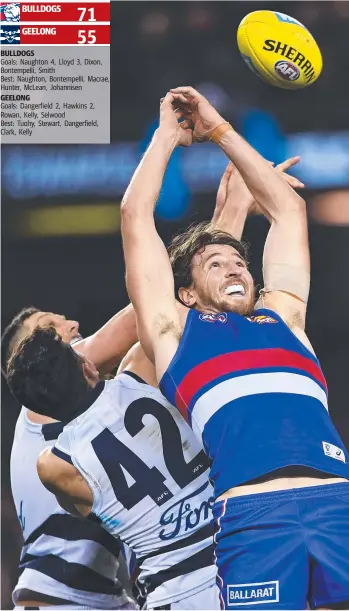  ?? Picture: JULIAN SMITH/AAP IMAGE ?? Bulldogs star Marcus Bontempell­i goes up for a mark during his team’s 16-point upset win over Geelong