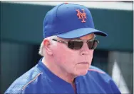  ?? Mark Brown / TNS ?? Mets manager Buck Showalter looks on from the dugout during a spring training game against the Marlins.