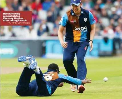  ?? PICTURE: Getty Images ?? Matt Critchley congratula­tes Chesney Hughes after taking a catch