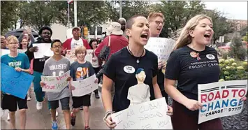  ?? GREENWICH ENTERTAINM­ENT ?? March for Our Lives activists Emma González, front left, and Jaclyn Corin appear in “Us Kids.”
