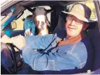  ?? COURTESY OF GARY MILES ?? Gary Miles of Placitas Animal Rescue shares the cab of his truck with a goat he found wandering near a highway.