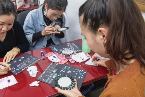  ??  ?? Hand Viet nail academy – where 90 per cent of graduates travel to other countries for work