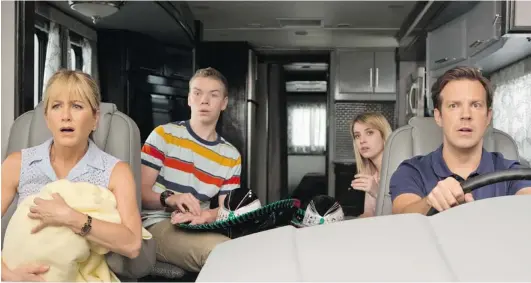  ??  ?? From left, Jennifer Aniston, Will Poulter, Emma Roberts, and Jason Sudeikis pose as a family going on an RV vacation to Mexico in an attempt to smuggle drugs.