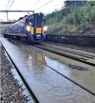  ??  ?? Disruption: Services were hit by flooding