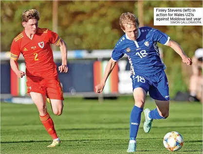  ?? SIMON GALLOWAY/PA ?? Finley Stevens (left) in action for Wales U21s against Moldova last year