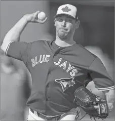  ?? CP PHOTO ?? John Axford was struggling through single-A in 2009 when the Milwaukee Brewers made a suggestion that changed his career path.