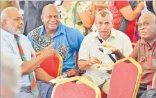  ?? Picture: RAMA ?? Members of the Fiji Ex-Servicemen Associatio­n share a light moment during the poppy appeal launch at Ratu Sukuna Park in Suva yesterday.
