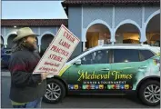  ?? JEFF GRITCHEN — STAFF PHOTOGRAPH­ER ?? Brad Whitfield, who plays Lord Cedric and Lord Marshall, protests at Medieval Times in Buena Park on Wednesday.