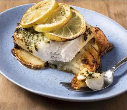  ?? America’s Test Kitchen ?? Roasted Cod With Lemon-garlic Potatoes cooks quickly in the air fryer.