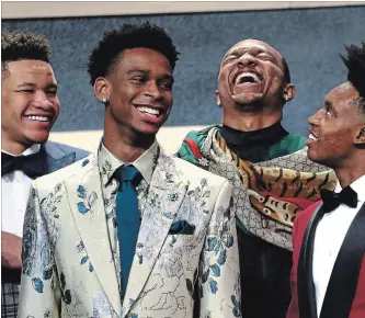  ?? MIKE STOBE GETTY IMAGES ?? Kevin Knox, left, Shai Gilgeous-Alexander, Wendell Carter Jr. and Collin Sexton share a laugh before the 2018 NBA draft at the Barclays Center in Brooklyn on Thursday.