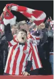  ??  ?? Sunderland fans celebrate.