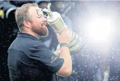  ?? REUTERS ?? Shane Lowry celebrates winning the 2019 British Open.