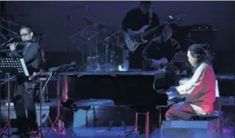  ?? PHOTOS PROVIDED TO CHINA DAILY ?? Above: Li Zhihui (right) plays the piano at a charity concert for blind children in 2014 in Beijing. Left: Li and band members perform at last year’s Silk Road Chinese Ethno Music Festival at the Pula Arena in Croatia.