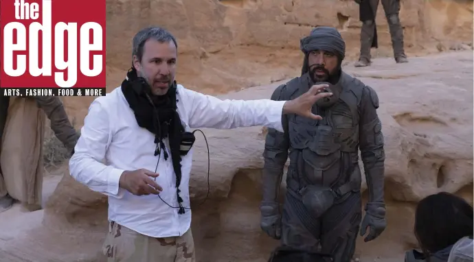  ?? ?? IN THE DESERT: Denis Villeneuve, left, directs Javier Bardem on the set of ‘Dune,’ the action adventure film based on Frank Herbert’s famed novel,