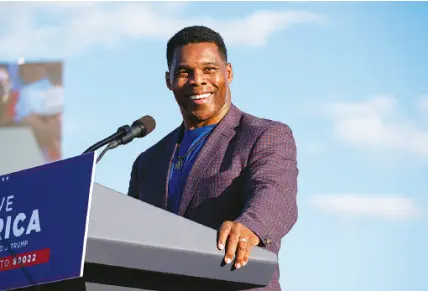  ?? AP PHOTO/BEN GRAY ?? Above: Senate candidate Herschel Walker speaks during former President Donald Trump’s Save America rally in Perry, Ga., on Sept. 25.