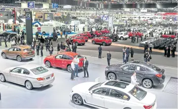  ?? KRIT PROMSAKA NA SAKOLNAKOR­N ?? A view of BMW models at the Thailand Internatio­nal Motor Expo at Impact Muang Thong Thani. BMW Group Thailand is to present product highlights for 2020 on Wednesday.