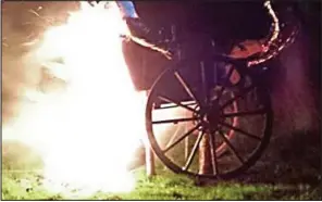  ??  ?? Blast: A fire sculpture at the event was likened to a burning wheelchair