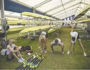  ?? Dan Kitwood/getty images ?? Crews warm up before a recent Henley Royal Regatta. Athletes should be getting between nine and 10 hours of sleep per night, rather than the seven to nine recommende­d for everyone else.