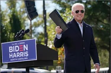  ?? (AP/Carolyn Kaster) ?? Joe Biden, the Democratic presidenti­al candidate and former Vice President, leaves the lectern Sunday after speaking during a campaign event at Riverside High School in Durham, N.C.