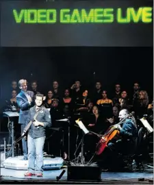  ?? PNG ?? For this year’s Video Games Live concert, the Halycon Chamber Choir joins the Saskatoon Symphony Orchestra with Tommy Tallarico, front,
who is a well-known video game composer.