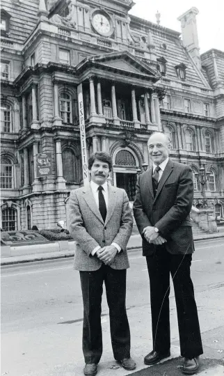  ?? DENIS CYR/GAZETTE FILES ?? Jean Doré, left, and Michael Fainstat outside city hall on Oct. 10, 1984. “It’s unbelievab­le, all the people that are swarming around us,” Fainstat remarked shortly after the Montreal Citizens’ Movement won the 1986 election and he was appointed...