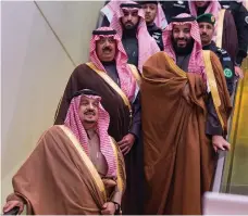  ?? Reuters ?? The crown prince of Saudi Arabia, Mohammed bin Salman, right, alongside Prince Miteb bin Abdullah at the annual horse race ceremony in Riyadh on Saturday