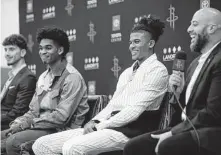  ?? Mark Mulligan / Staff photograph­er ?? The Rockets drafted guard Jalen Green, second from right, with the second overall selection in July’s NBA draft.