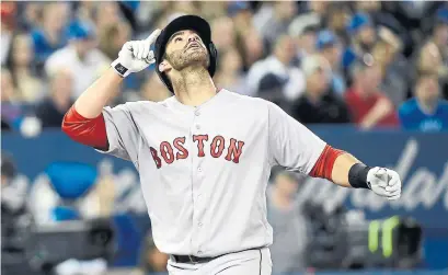  ?? NATHAN DENETTE/THE CANADIAN PRESS ?? Red Sox outfielder J.D. Martinez’s three-run home run against the Blue Jays on Thursday night lifted Boston to a 5-4 win.