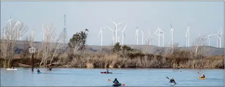  ?? ANDA CHU — STAFF PHOTOGRAPH­ER ?? A group of kayakers head out on a sunset paddle to West Island along the San Joaquin River in Antioch on Feb. 17, 2018. The city of Antioch secured water rights to the river more than 150 years ago that allows it to keep pumping the water at any time.