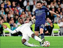  ?? GETTY IMAGES ?? Dominant: Camavinga tackles Bernardo Silva