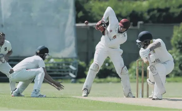  ??  ?? Seaham Habour batsman Mark Marwood looks to have escaped the clutches of Ryhope’s wicket-keeper last weekend.